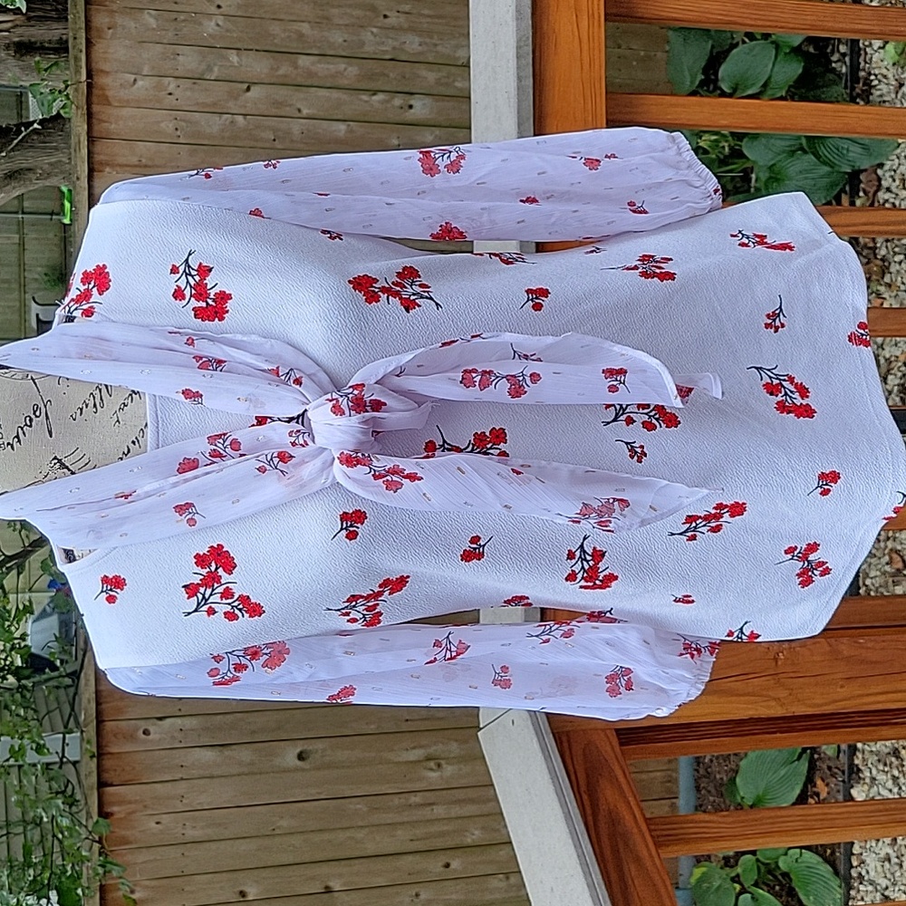 White and red floral blouse